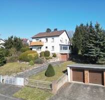 Zweifamilienhaus mit spektakulärer Aussicht und großem Grundstück in Kasseler Höhenlage!