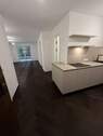Blick in die Wohnung - Exklusive 2- Zimmer Neubauwohnung im EG mit Garten in München - Solln