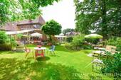 Biergarten - Mehrfamilienhaus, Wohnhaus zum Kaufen in Bad Zwischenahn / Elmendorf