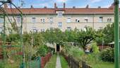 Rückansicht - 2-Zimmer-Wohnung mit guter Raumaufteilung + Eigener Garten