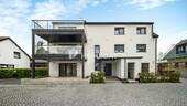 Außenansicht 1 - Großzügig & modern: 149?m² EG-Wohnung mit 3 Terrassen, 2 Stellplätzen - sofort bezugsfrei