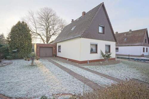 Frontansicht mit Garage - 4 Zimmer Einfamilienhaus zum Kaufen in Bremerhaven