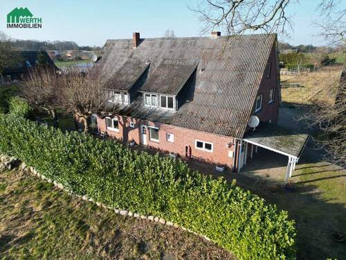 Luftaufnahme - 9 Zimmer Mehrfamilienhaus, Wohnhaus in Burweg / Bossel