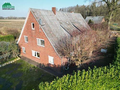 Luftaufnahme - Mehrfamilienhaus, Wohnhaus mit 311,60 m&sup2; in Burweg / Bossel zum Kaufen