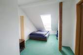 Zimmer im Dachgeschoss - 