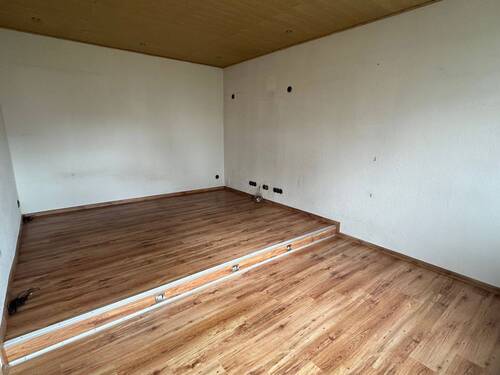 Wohnzimmer - Mehrfamilienhaus, Wohnhaus mit 150,00 m&sup2; in Brake zum Kaufen