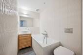 Badezimmer mit Badewanne - 
