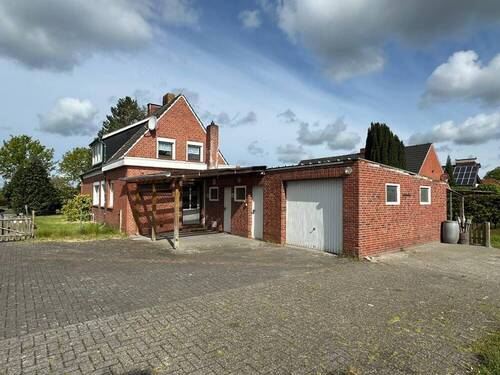 Rückansicht - 5 Zimmer Einfamilienhaus in Ostrhauderfehn