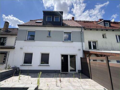 Außenansicht von der Terrasse - Reihenmittelhaus mit 149,00 m² in Leipzig zum Kaufen