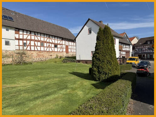 Garten mit Blick auf das Haus - 