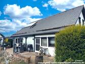 Bild 2 Wohnhaus Rückansicht - 7 Zimmer Einfamilienhaus zum Kaufen in Dissen-Striesow