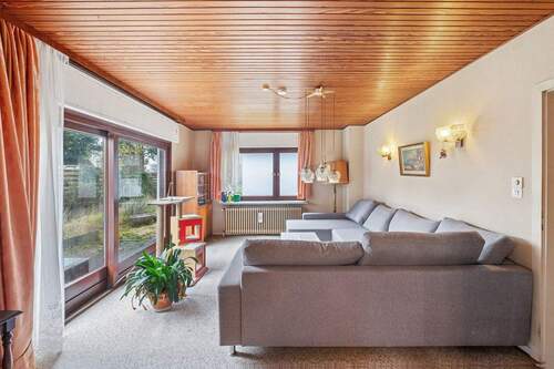 Wohnzimmer mit Zugang zur Terresse - 