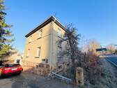 Hausansicht 2 - 6 Zimmer Mehrfamilienhaus, Wohnhaus zum Kaufen in Döbeln