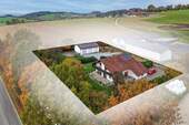Bild 1 - Wohnen und Arbeiten vereint: Zweifamilienhaus mit Lagerhalle auf großzügigem Gewerbegrundstück!