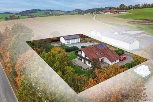 Bild 1 - Wohnen und Arbeiten vereint: Zweifamilienhaus mit Lagerhalle auf großzügigem Gewerbegrundstück!