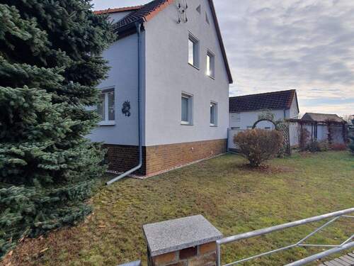 Seitenansicht - 6 Zimmer Doppelhaushälfte zum Kaufen in Muldestausee