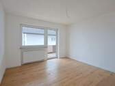 Schlafzimmer mit Zugang zum Balkon - 