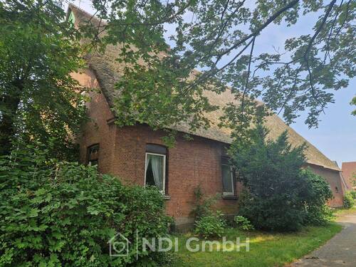 Seitenansicht - 9 Zimmer Mehrfamilienhaus, Wohnhaus zum Kaufen in Elmshorn