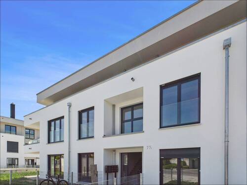 Außenansicht - Energierelevante 3-Zimmer Wohnung mit Terrasse und Gartenanteil