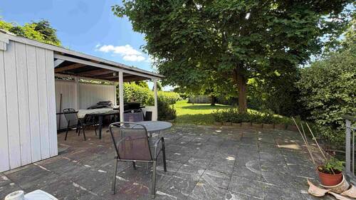Terrasse mit Unterstand - Mehrfamilienhaus, Wohnhaus mit 260,00 m&sup2; in Uetersen zum Kaufen