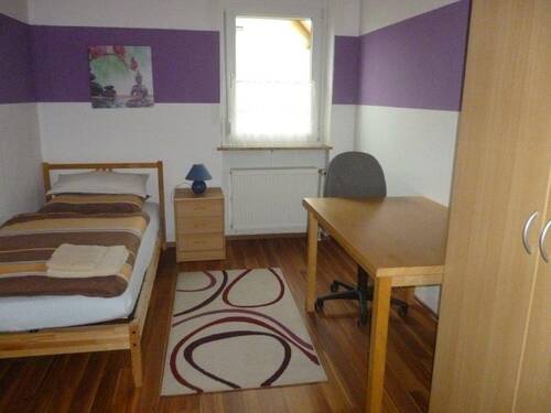 1. Schlafzimmer Wohnung Obergeschoss - 
