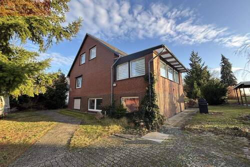 Frontansicht - Jetzt fertigstellen: Einfamilienhaus im Rohbau mit Bauland