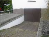 Einfahrt zur Kellergarage.jpg - 5 Zimmer Terrassenwohnung in Northeim