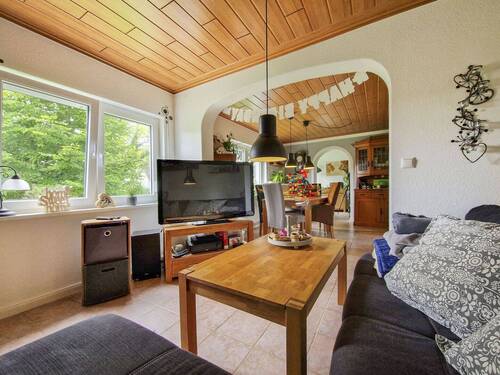 Wohnzimmer im EG - Einfamilienhaus mit 100,00 m&sup2; in Itzehoe zum Kaufen