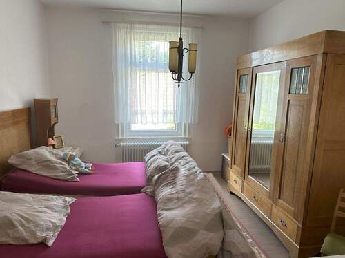 Zimmer im Dachgeschoss - 