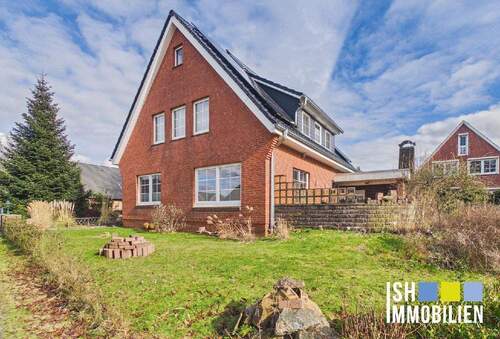 Bild 1 - Hemmoor-Basbeck: Einfamilienhaus energetisch auf dem neusten Stand in ruhiger Lage