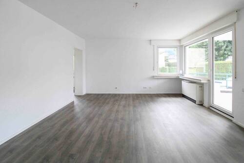 01_Wohn- und Esszimmer - Ansprechender Zustand: 2-Zi.-Whg. mit großem Balkon in Hattingen