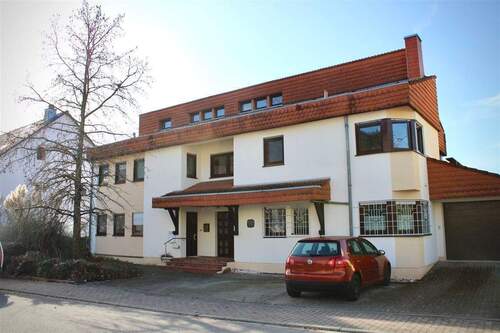 Hausansicht - Doppelhaushalte mit Einliegerwohnung - offener Kamin, beeindruckende Raumhöhe & Garagenkomfort