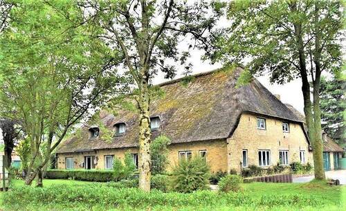 Ansicht - Tolles Reetdach-Haus Resthof mit 2 Wohnungen in Drage bei Friedrichstadt. Ansehen !