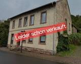 Bild 1 - Renovierungsbedürftiges Mehrfamilienhaus in beliebter Lage