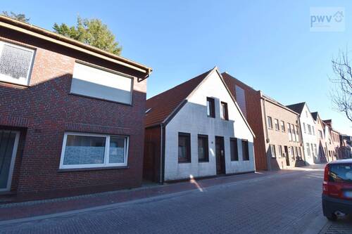 Bild 2 - 5 Zimmer Mehrfamilienhaus, Wohnhaus zum Kaufen in Aurich