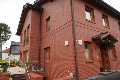 Seitenansicht - 1 Zimmer Doppelhaushälfte in Oranienburg