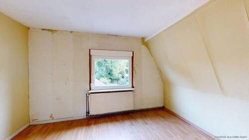 Zweites Schlafzimmer im Dachgeschoss mit Blick in - Doppelhaushälfte mit 77,00 m² in Hamm zum Kaufen