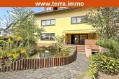 Gartenansicht - großzügiges Familienhaus mit Büro, Doppelgarage und schönem Grundstück!