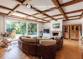 Wohnzimmer - 5 Zimmer Bungalow zum Kaufen in Münster