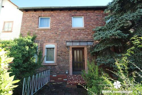 Frontansicht Wohnhaus - 6 Zimmer Einfamilienhaus zum Kaufen in Stockstadt am Main