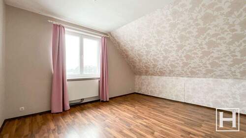 Schlafzimmer im Dachgeschoss - 