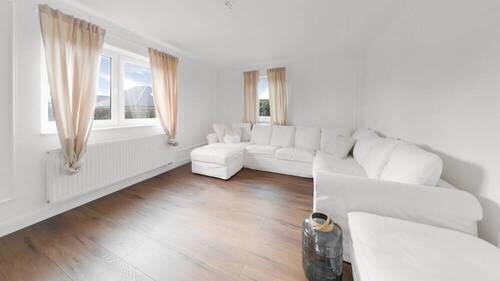Wohnzimmer - 6 Zimmer Einfamilienhaus zum Kaufen in Lähden / Holte