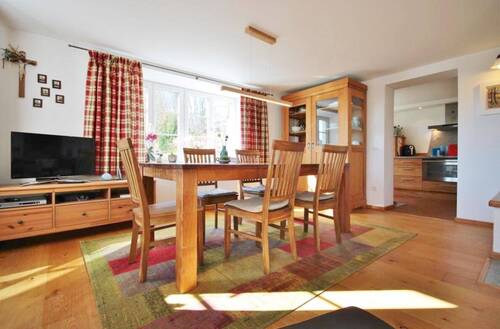Esszimmer mit Kachelofen - Whg.-Nr. 1 (EG) - 