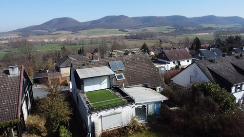 Hausansicht Terrasse - 6 Zimmer Einfamilienhaus zum Kaufen in Alfeld
