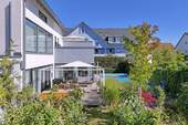 das Anwesen mit Garten - Mehrfamilienhaus, Wohnhaus zum Kaufen in München