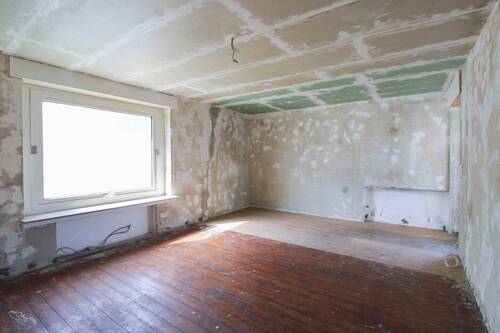 Wohnzimmer EG - Einfamilienhaus mit 151,00 m² in Löhne zum Kaufen