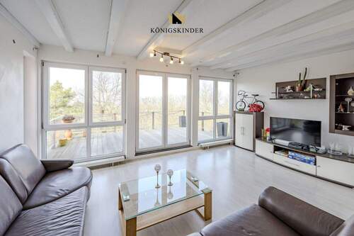 Wohnbereich mit Zugang zur Terrasse 2 WHG 2 - 