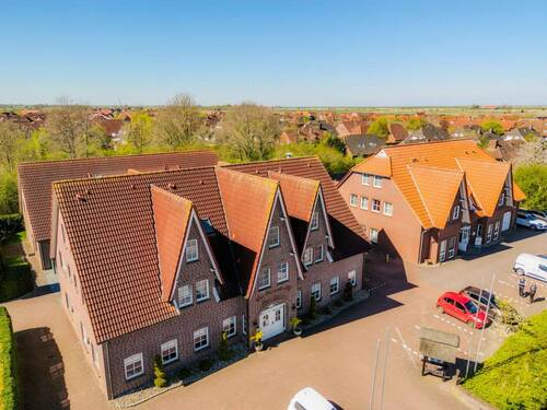 Ansicht - 3 Zimmer Mehrfamilienhaus, Wohnhaus zum Kaufen in Krummhörn