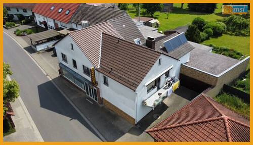 Blick auf das Haus - WOHN- UND GESCHÄFTSHAUS MIT WEITLÄUFIGEM GARTEN! KEINE KÄUFERPROVISION!