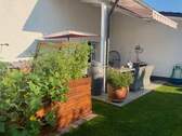 Ostterrasse mit Garten - 
